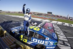 Jimmie Johnson celebrates on Sunday after becoming the first driver to win four Bank of America 500 NASCAR Sprint Cup Series races at Charlotte Motor Speedway