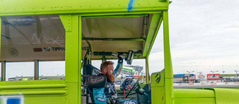 Multiply Church’s Zach Whitt let “Jesus, Take the Wheel” all the way to the checkered flag in the Cook Out Summer Shootout’s “Faster Pastor” school bus race.