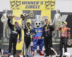 From left, John Force, Antron Brown, Jason Line and Chip Ellis claimed wins in the NHRA Carolina Nationals on Sunday at zMAX Dragway.