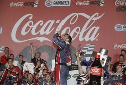 Austin Dillon celebrates in Charlotte Motor Speedway's winner's circle early Monday morning after winning the Coca-Cola 600.