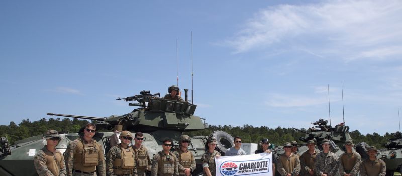 Stewart-Haas Racing driver Aric Almirola and Charlotte Motor Speedway Executive Vice President and General Manager Greg Walter visited 2D LAR Battalion at Camp Lejeune Tuesday as part of the speedway's Mission 600 campaign to salute men and women in the U.S. Armed Forces ahead of the Coca-Cola 600 on Memorial Day Weekend.