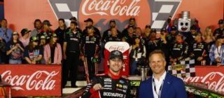 Ryan Blaney, left, poses with Speedway Motorsports President and CEO Marcus Smith after Blaney won Monday's Coca-Cola 600 at Charlotte Motor Speedway.