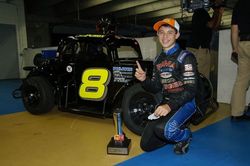 Chase Purdy scored an impressive opening-night victory in the Bojangles' Summer Shootout In Light Wellness Legend Car Pro feature on Tuesday at Charlotte Motor Speedway