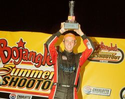 Jordan Black celebrates after winning the In Light Wellness Legend Car Pro feature during Bojangles' Summer Shootout on Tuesday at Charlotte Motor Speedway.