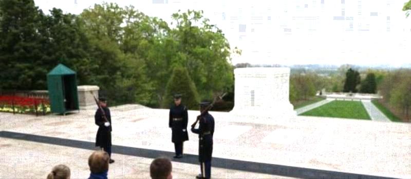 Left to right) Paige Keselowski, Brad Keselowski, Rep. Richard Hudson, Marcus Smith and Greg Walter watch a changing-of-the-guard ceremony at the iconic Tomb of the Unknown Soldier during a visit to the Arlington National Cemetery on Wednesday to kick off Charlotte Motor Speedway's Mission 600.