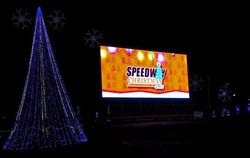An expansive display of 3 million Christmas lights filled up a 3.75-mile course during Saturday's opening night of Speedway Christmas at Charlotte Motor Speedway